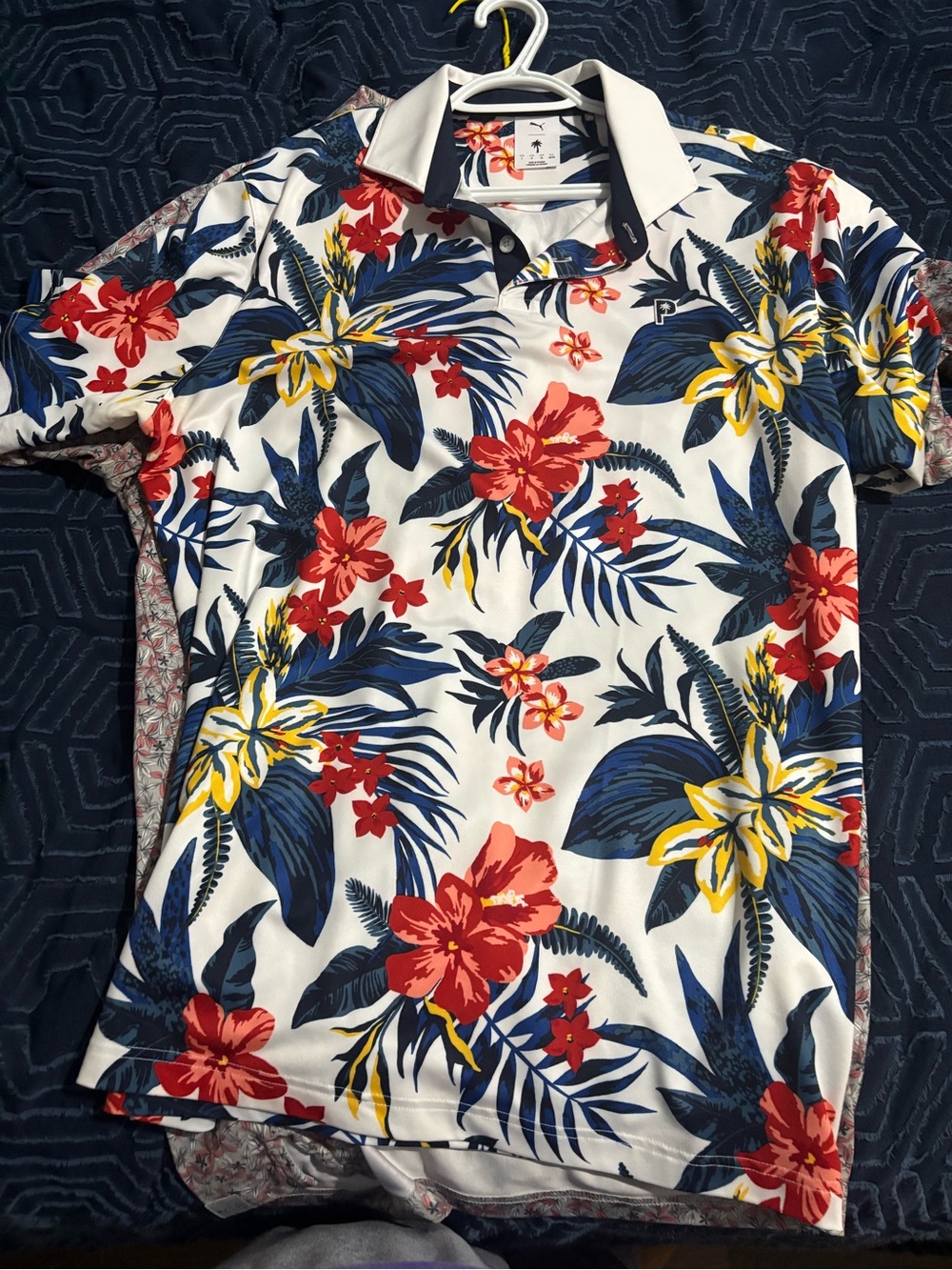 Men’s large Puma golf shirt.